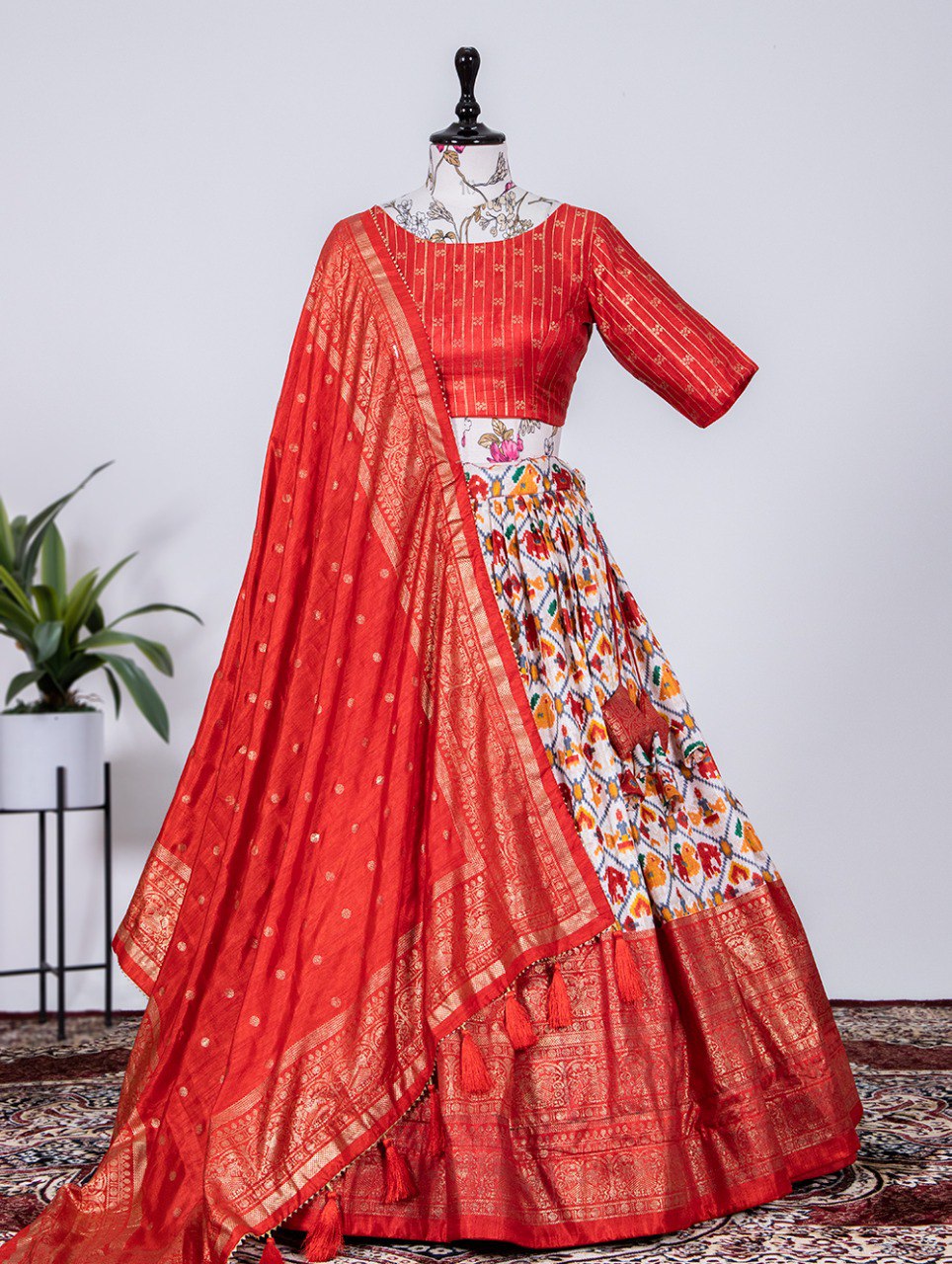 A playful medley of colors mixed with aesthetics from the classic era- this dola silk lehenga