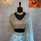 Sehen Sie umwerfend aus in diesem wunderschönen cremefarbenen Lehenga-Set