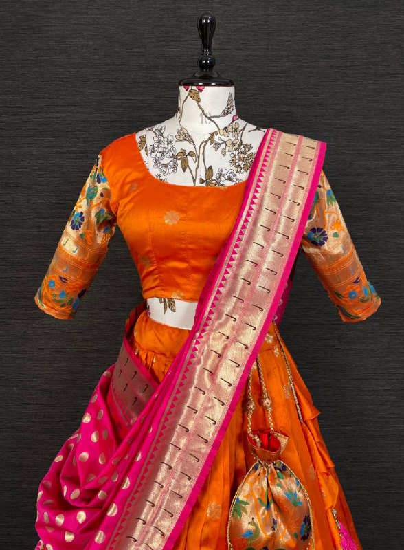 Get traditional touch to your look adorning this orange color lehenga