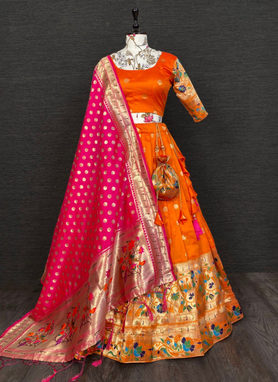 Get traditional touch to your look adorning this orange color lehenga