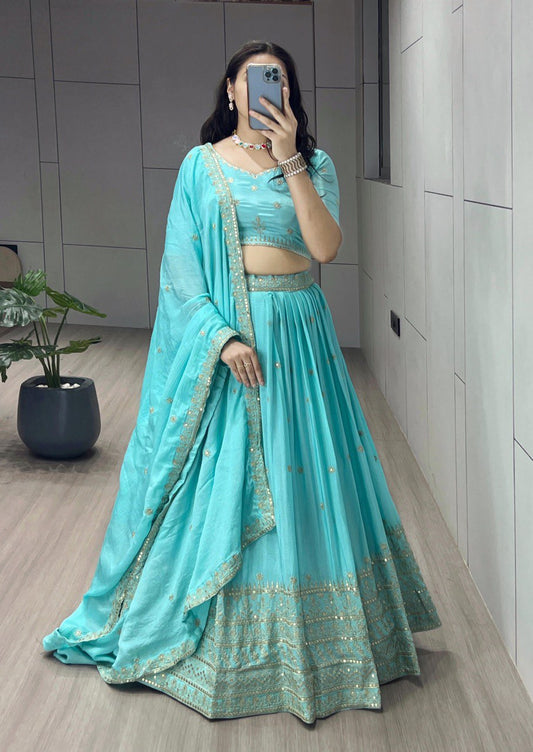 Be the epitome of grace in this Sky Chinon Shiny Lehenga