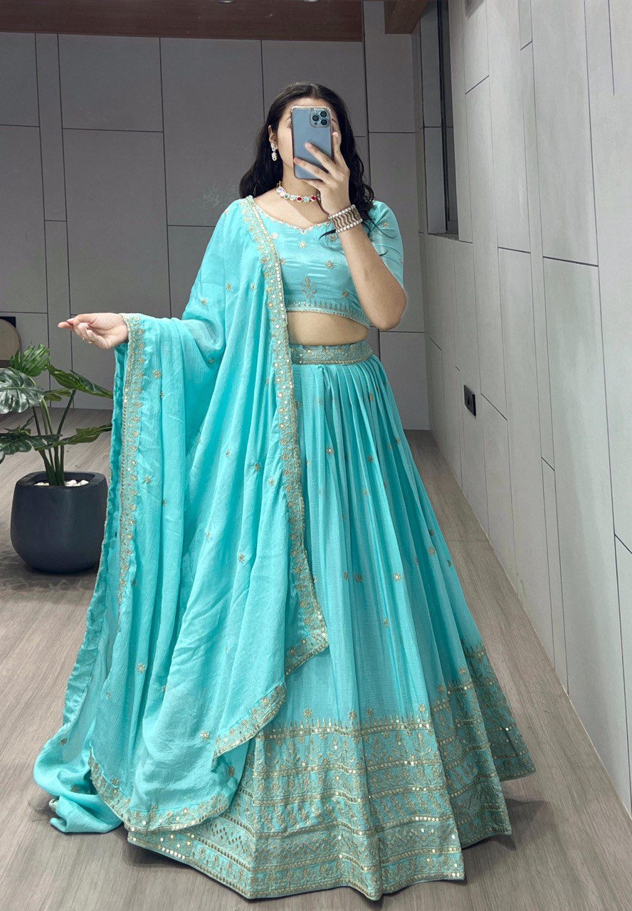 Be the epitome of grace in this Sky Chinon Shiny Lehenga