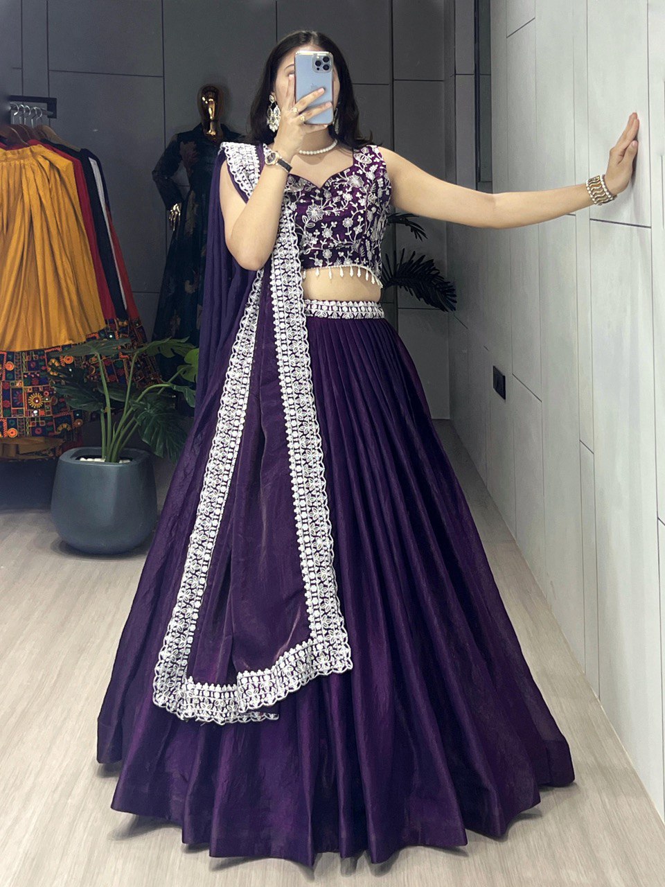 Traditional Indian lehenga set in a rich deep purple shade