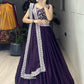 Traditional Indian lehenga set in a rich deep purple shade