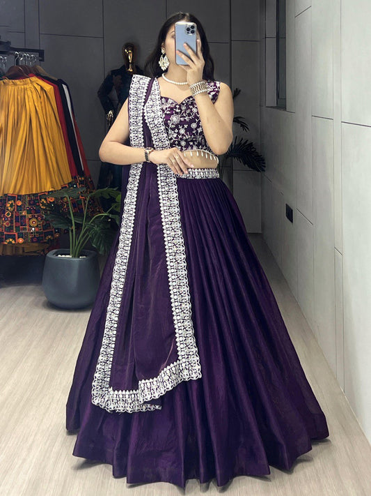 Traditional Indian lehenga set in a rich deep purple shade
