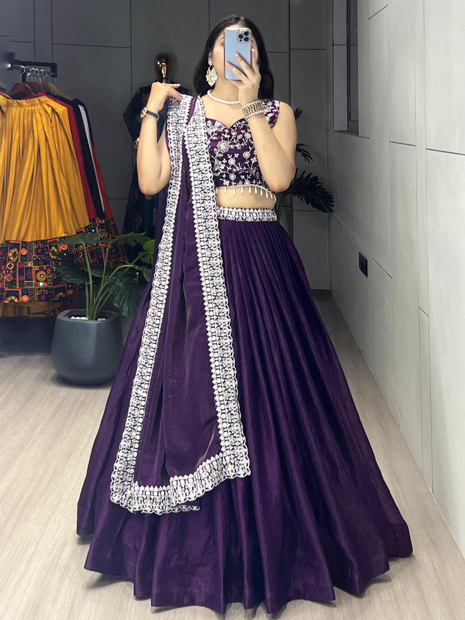 Traditional Indian lehenga set in a rich deep purple shade