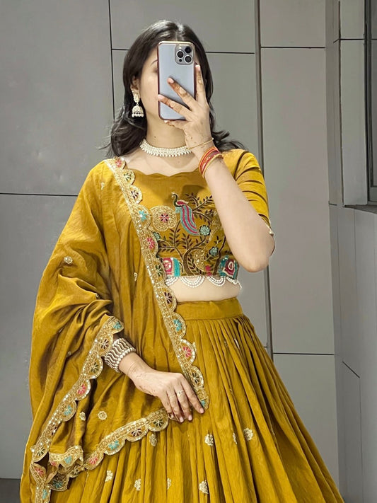 Dazzle in our embroidered Musturd Haldi Yellow lehenga