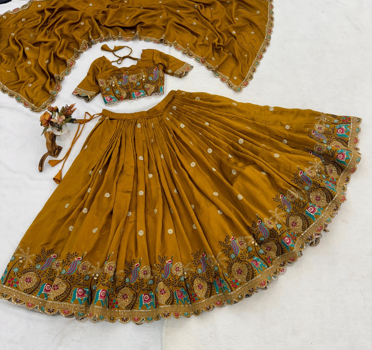 Dazzle in our embroidered Musturd Haldi Yellow lehenga