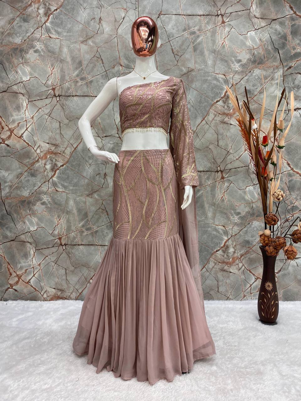 BOUTIQUE STYLE NEW FANCY PARTY WEAR FAUX GEORGETTE SEQUENCE WORK AND RUFFLE LEHENGA