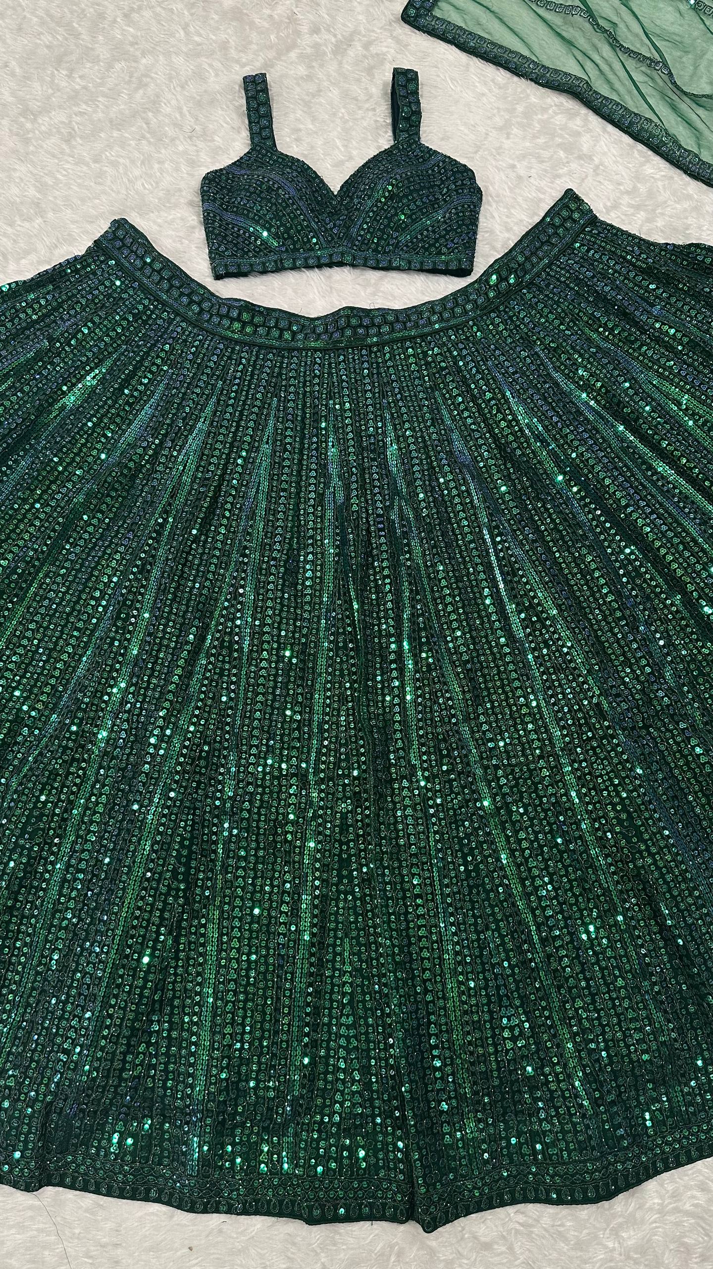 Net lehenga with rainbow sequins & dori work choli