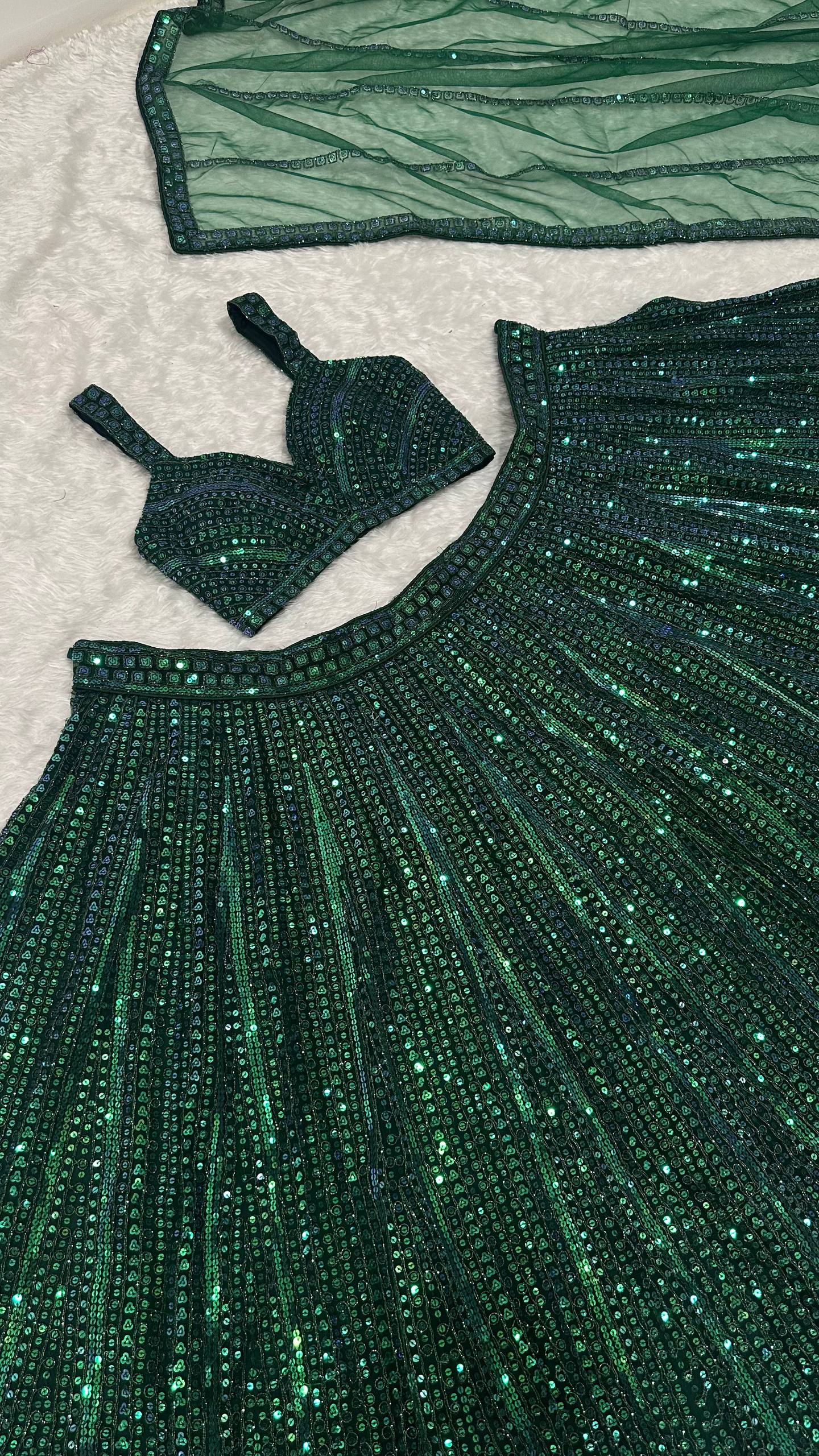 Net lehenga with rainbow sequins & dori work choli