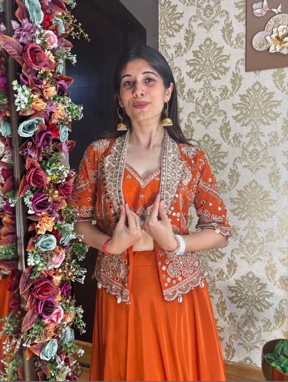 Experience effortless luxury with this premium Orange Lehenga choli