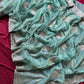 Pure zari tissue silk saree in a solid color with embroidery saree
