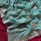 Pure zari tissue silk saree in a solid color with embroidery saree
