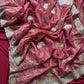 Pure zari tissue silk saree in a solid color with embroidery saree