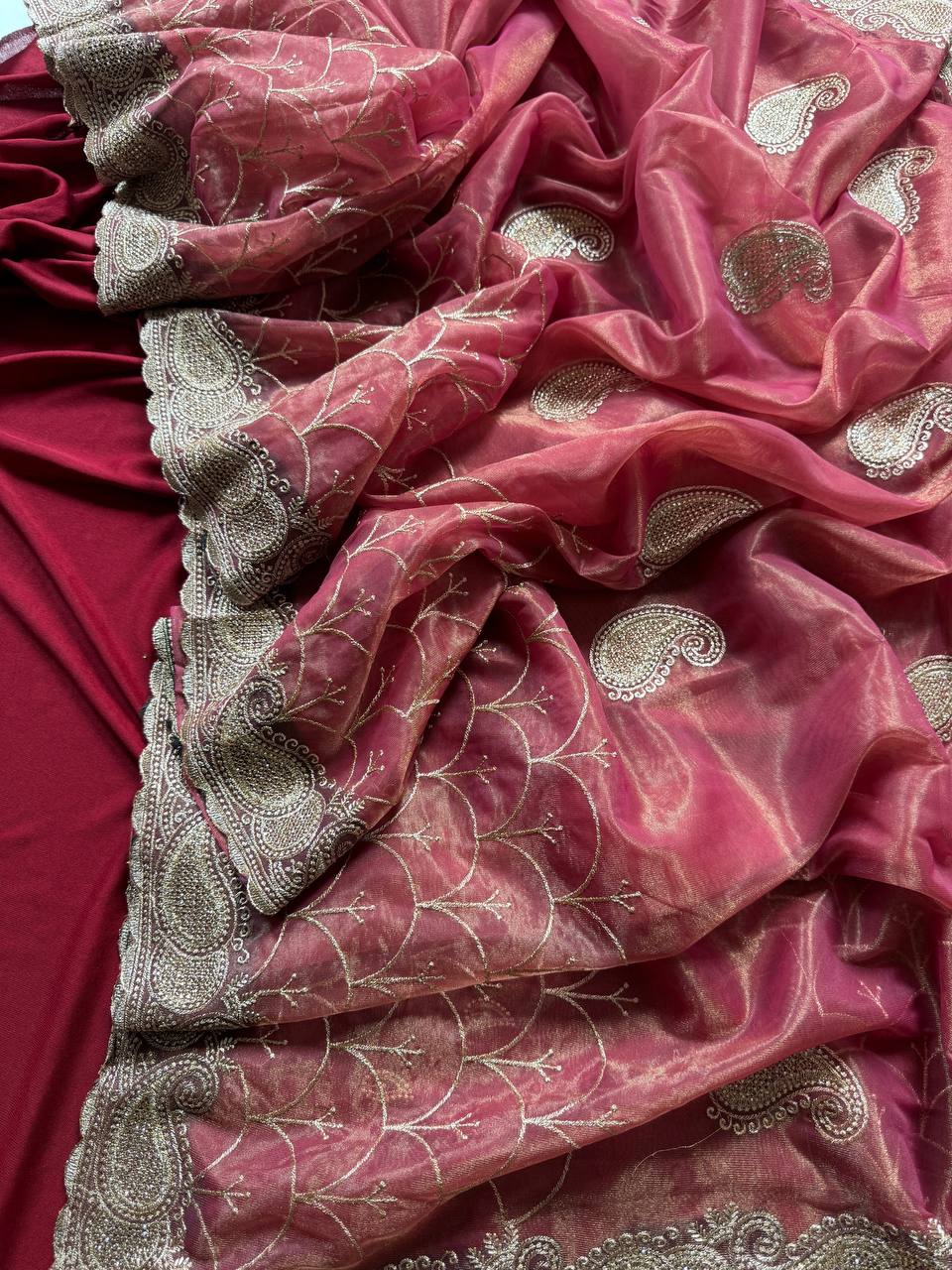 Pure zari tissue silk saree in a solid color with embroidery saree