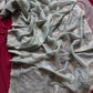 Pure zari tissue silk saree in a solid color with embroidery saree
