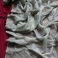 Pure zari tissue silk saree in a solid color with embroidery saree