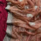 Pure zari tissue silk saree in a solid color with embroidery saree