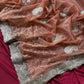 Pure zari tissue silk saree in a solid color with embroidery saree