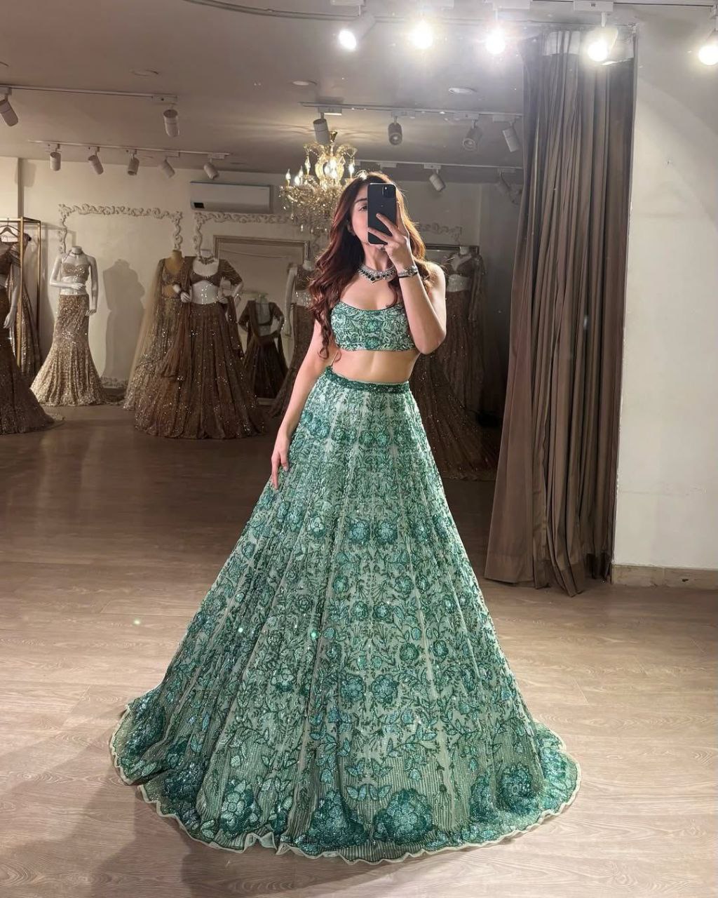Premium Faux Georgette Embellished With Beautiful Thread Embroidery Lehenga