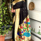 Royal blend of tradition and luxury Unveiling this black woven zari silk saree