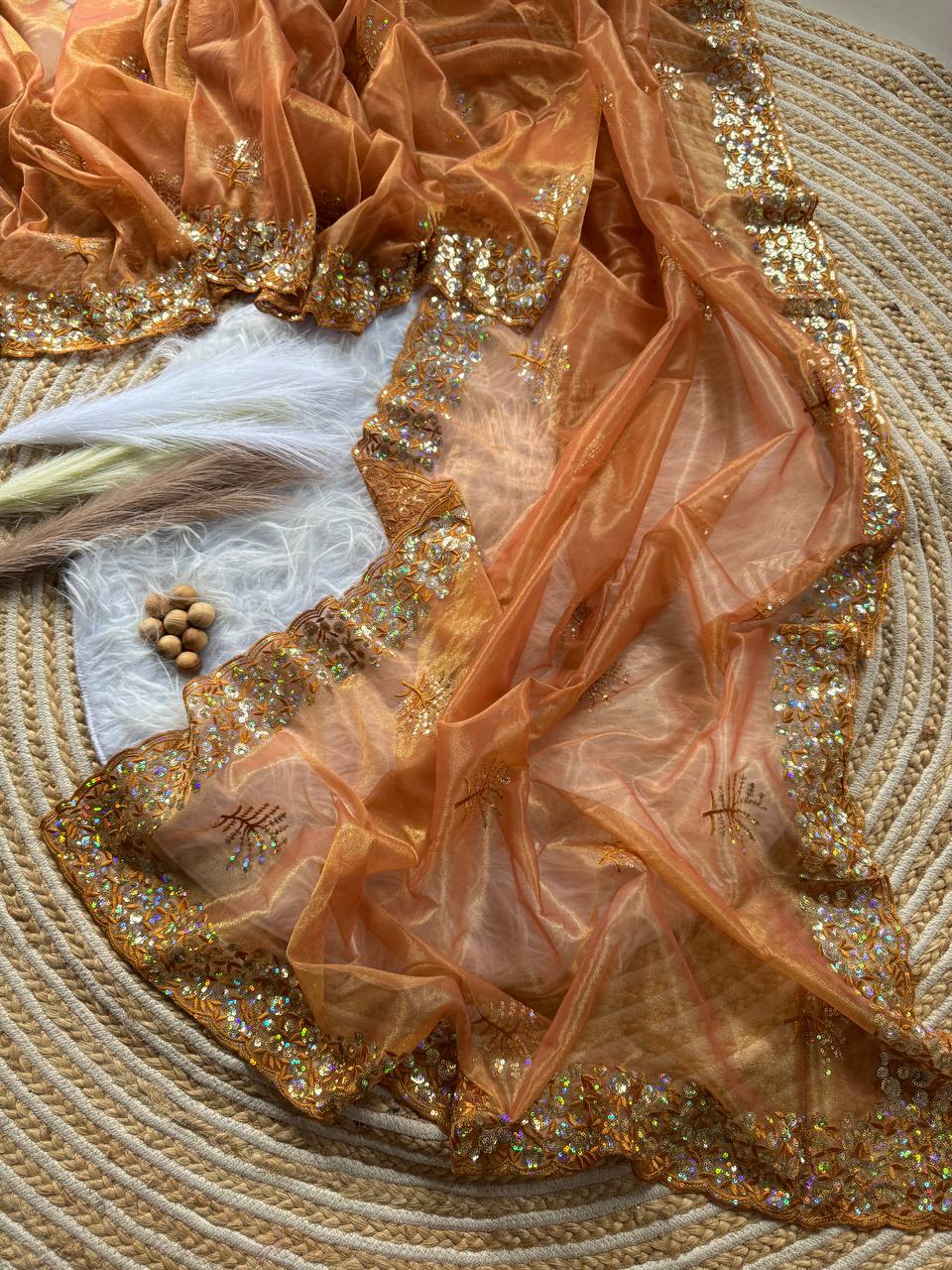 Pure Tissue silk saree in a solid color with embroidery viscos saree