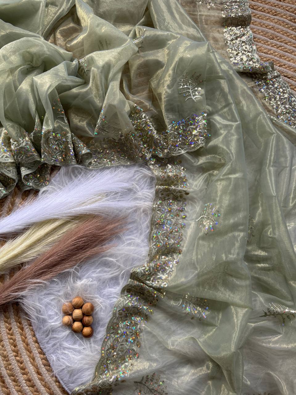 Pure Tissue silk saree in a solid color with embroidery viscos saree