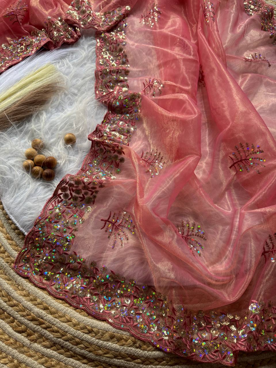 Pure Tissue silk saree in a solid color with embroidery viscos saree