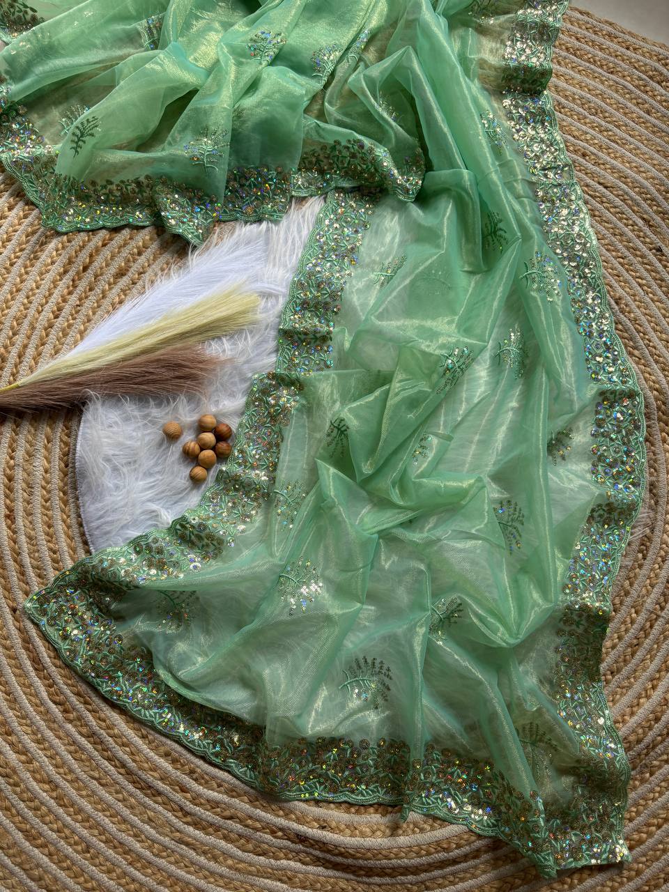Pure Tissue silk saree in a solid color with embroidery viscos saree