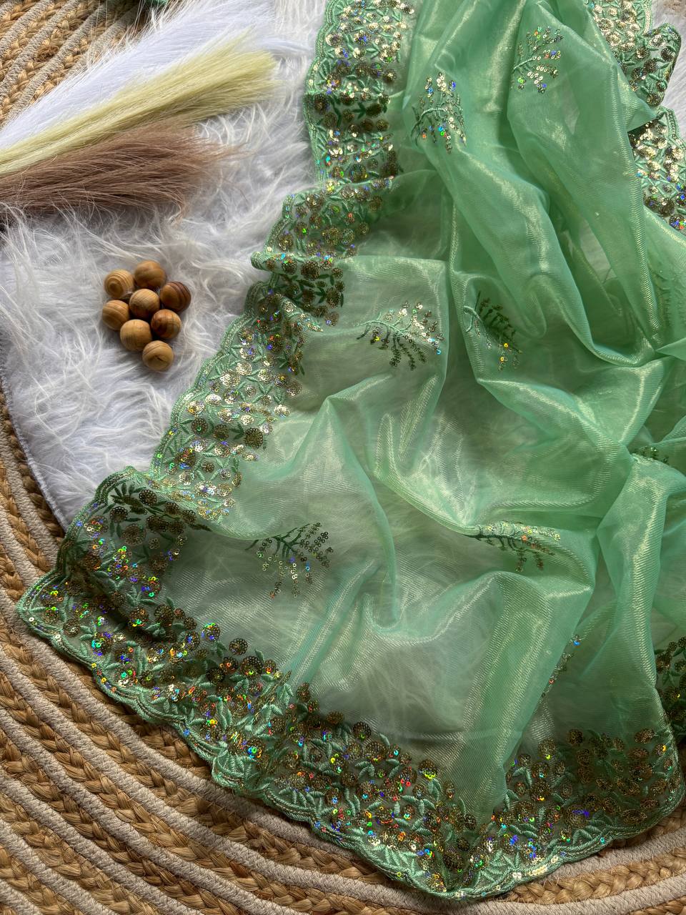 Pure Tissue silk saree in a solid color with embroidery viscos saree