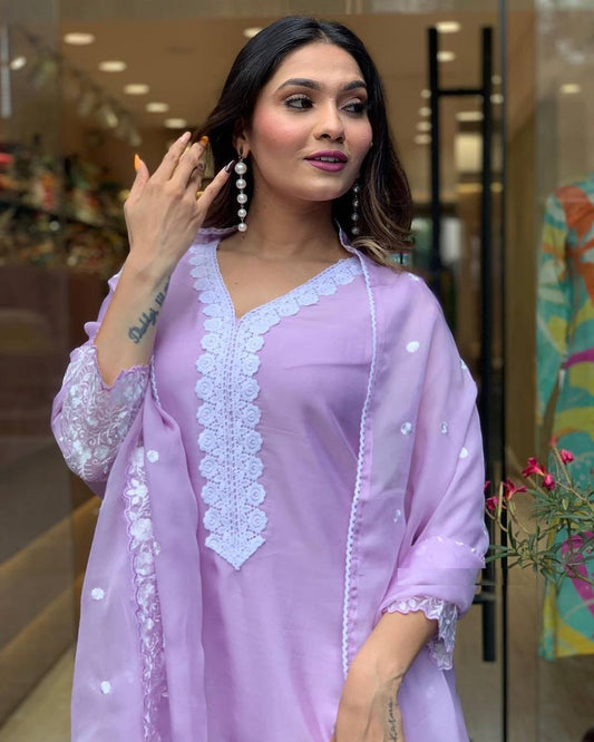 Lavendar colour 3 pair kurti Set  seems to be a party wear outfit