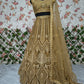 Sehen Sie umwerfend aus in diesem wunderschönen cremefarbenen Lehenga-Set