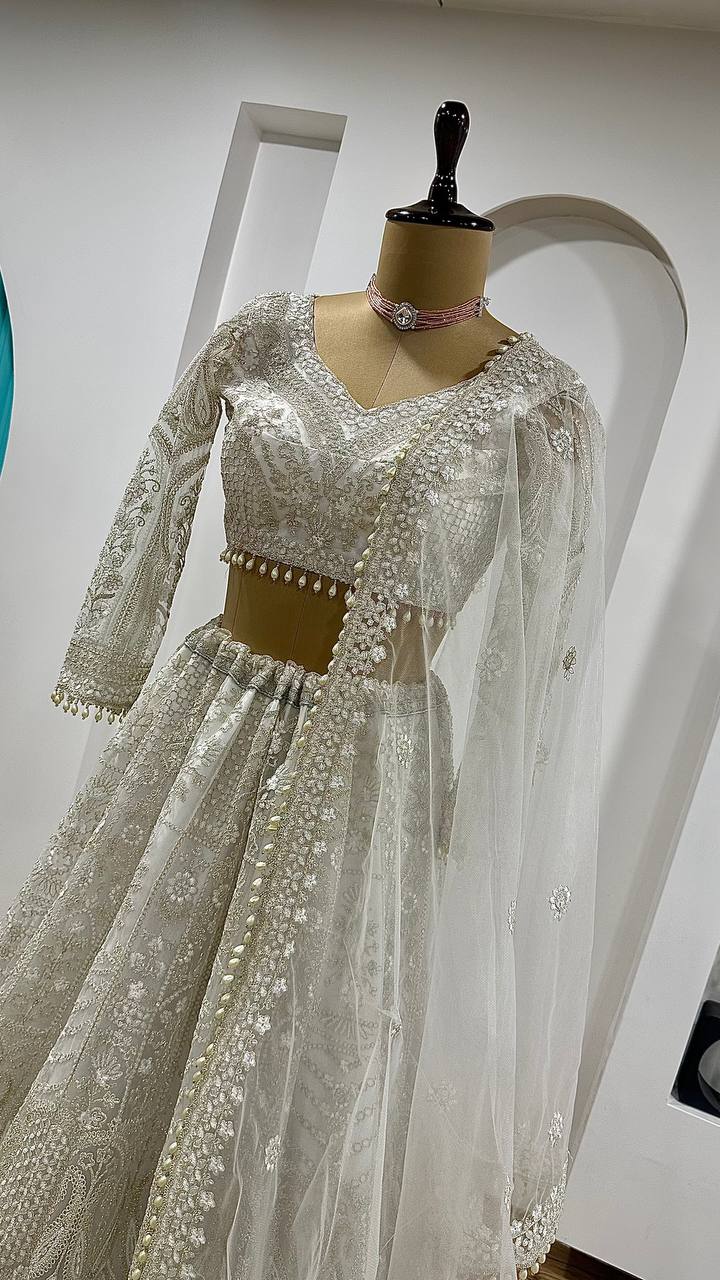 Net lehenga with sequins dori & thread work Choli