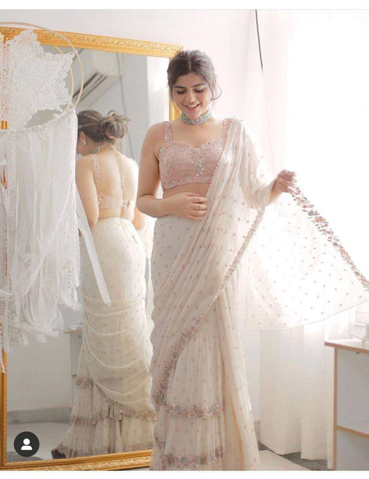 Georgette sarees with all over zari work butta and multi embroidery Saree