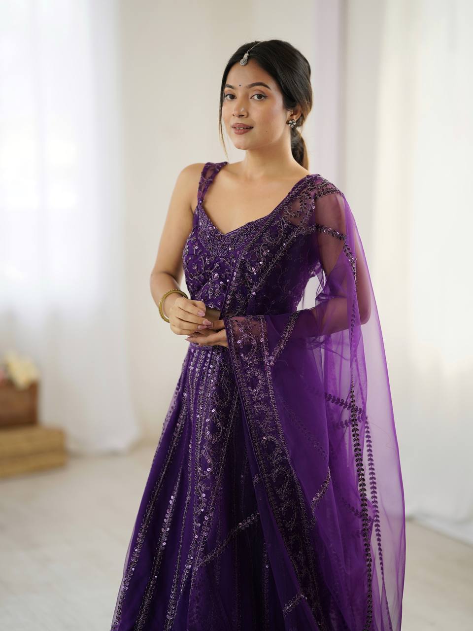 Net lehenga with sequins & Dori work Choli