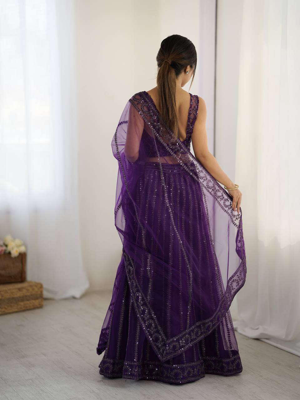 Net lehenga with sequins & Dori work Choli