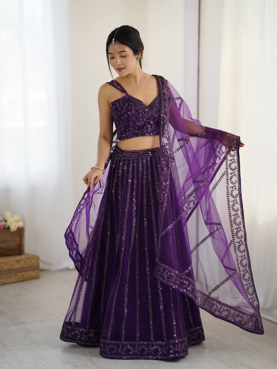 Net lehenga with sequins & Dori work Choli