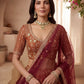 Gadhwal Silk And Dupatta Are Fabricated On Net Pair Lehenga