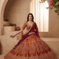 Gadhwal Silk And Dupatta Are Fabricated On Net Pair Lehenga