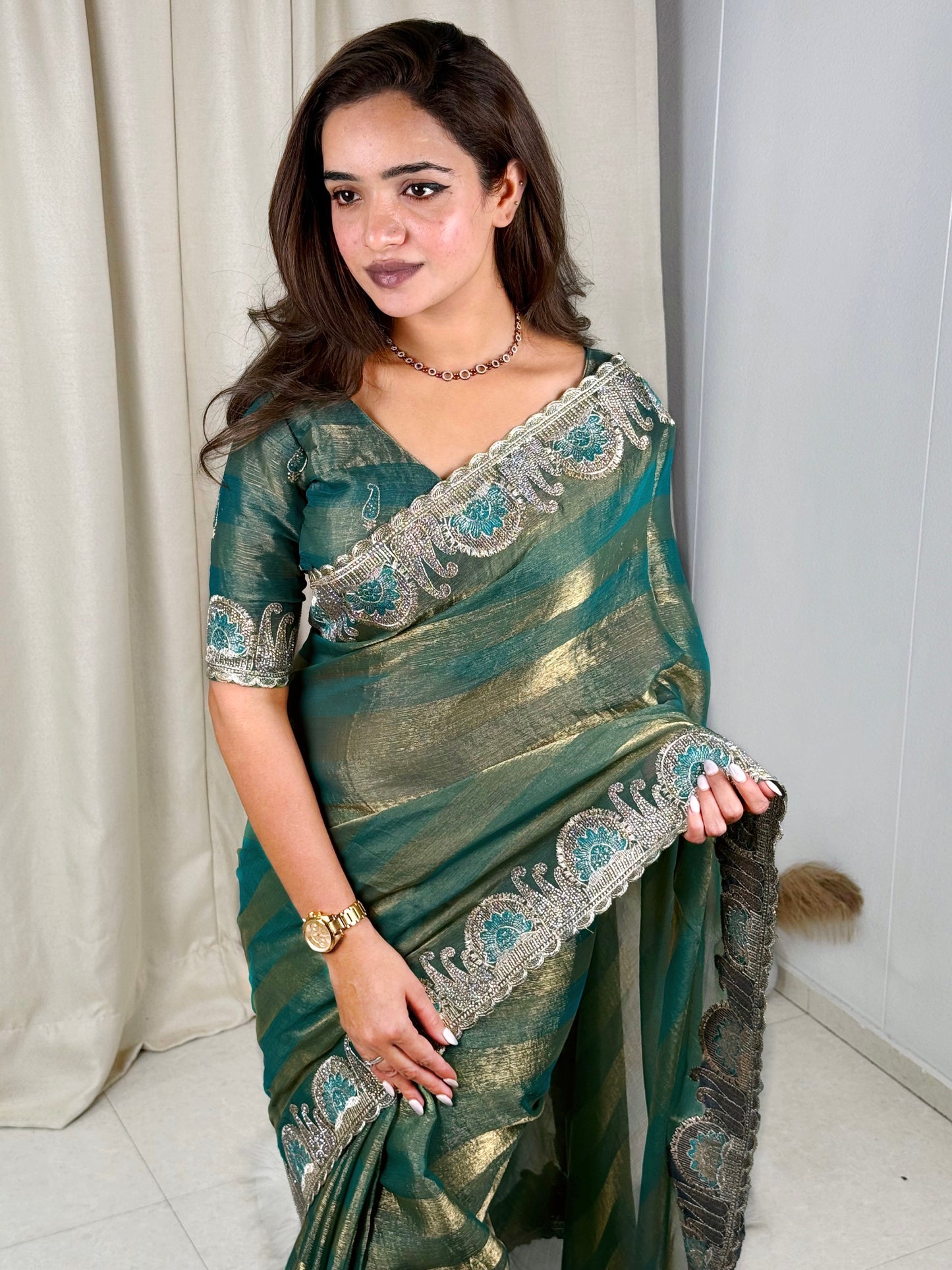fandy chiffon saree adorned with intricate zari embroidered saree