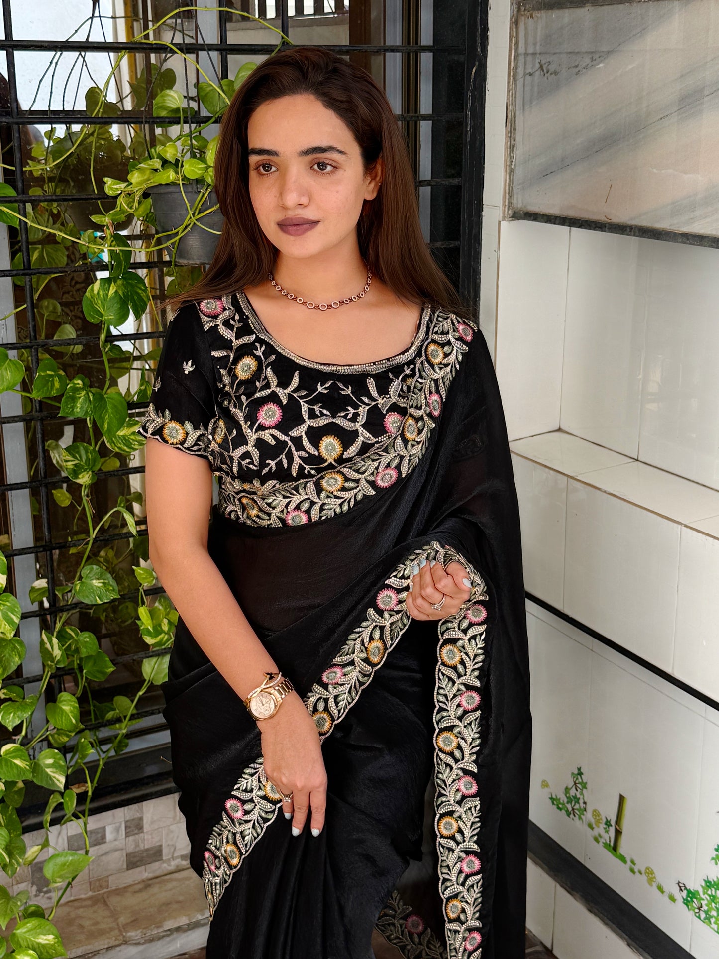 fandy satin saree adorned with intricate zari embroidered choli