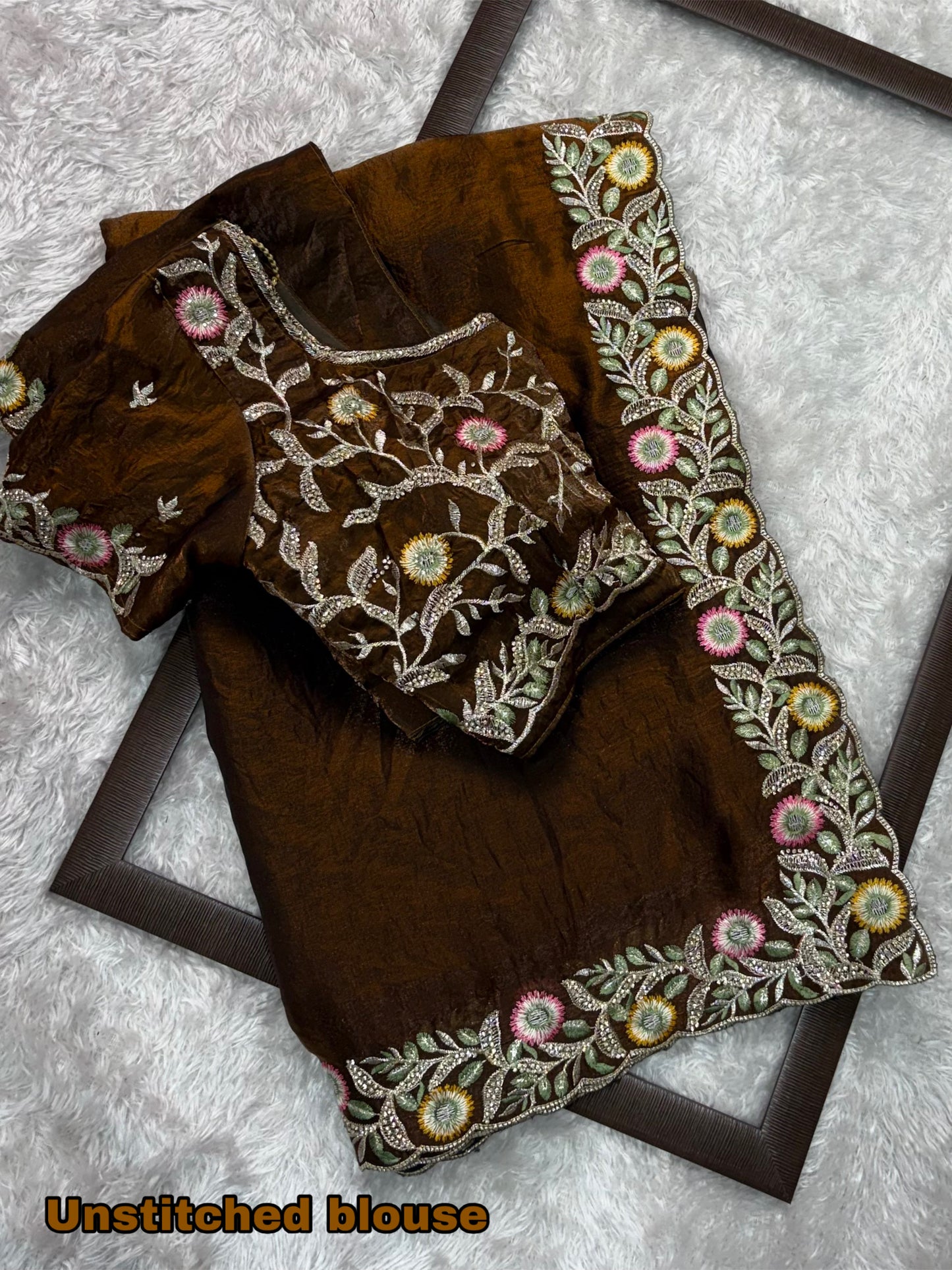 fandy satin saree adorned with intricate zari embroidered choli