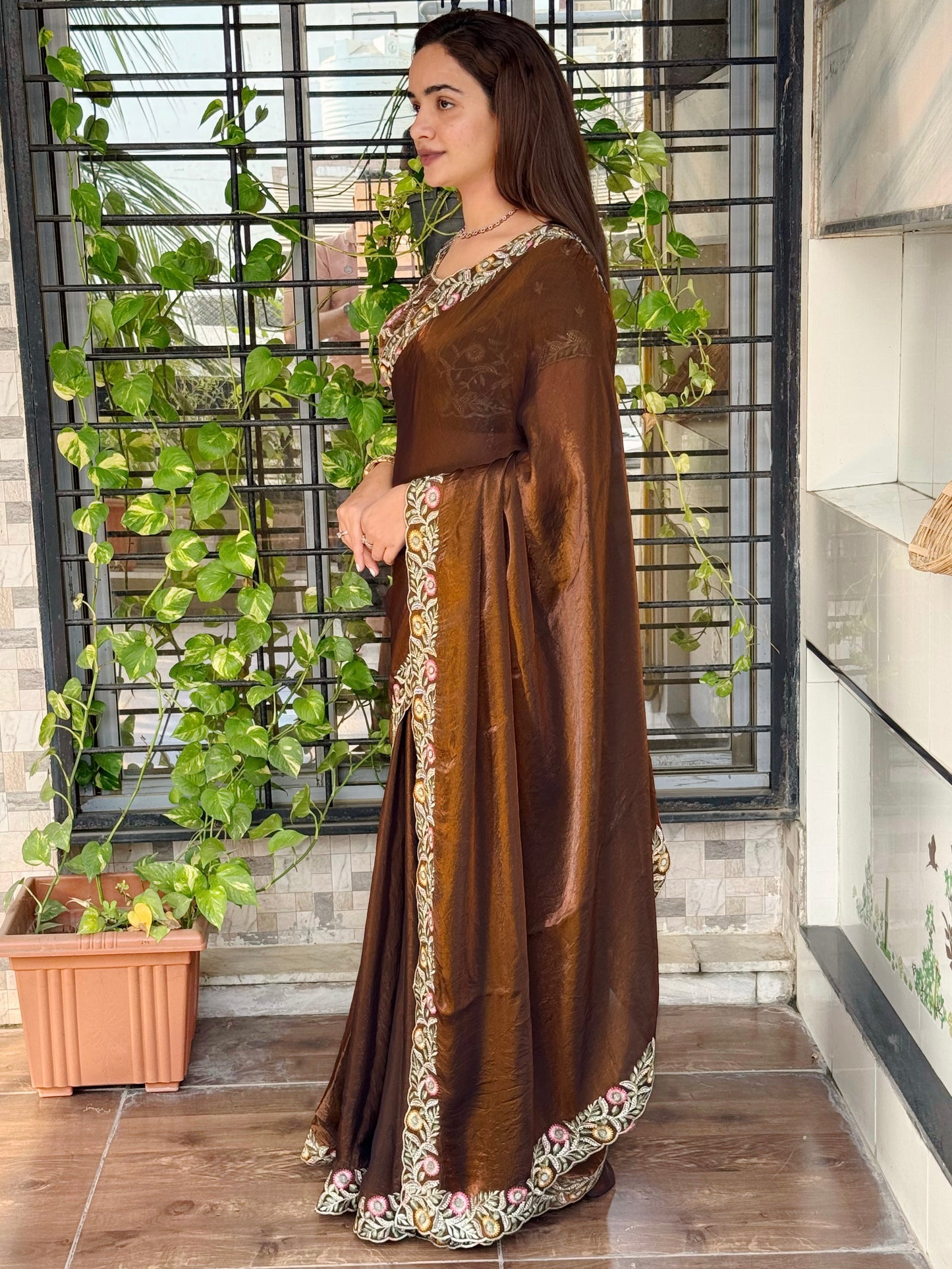 fandy satin saree adorned with intricate zari embroidered choli