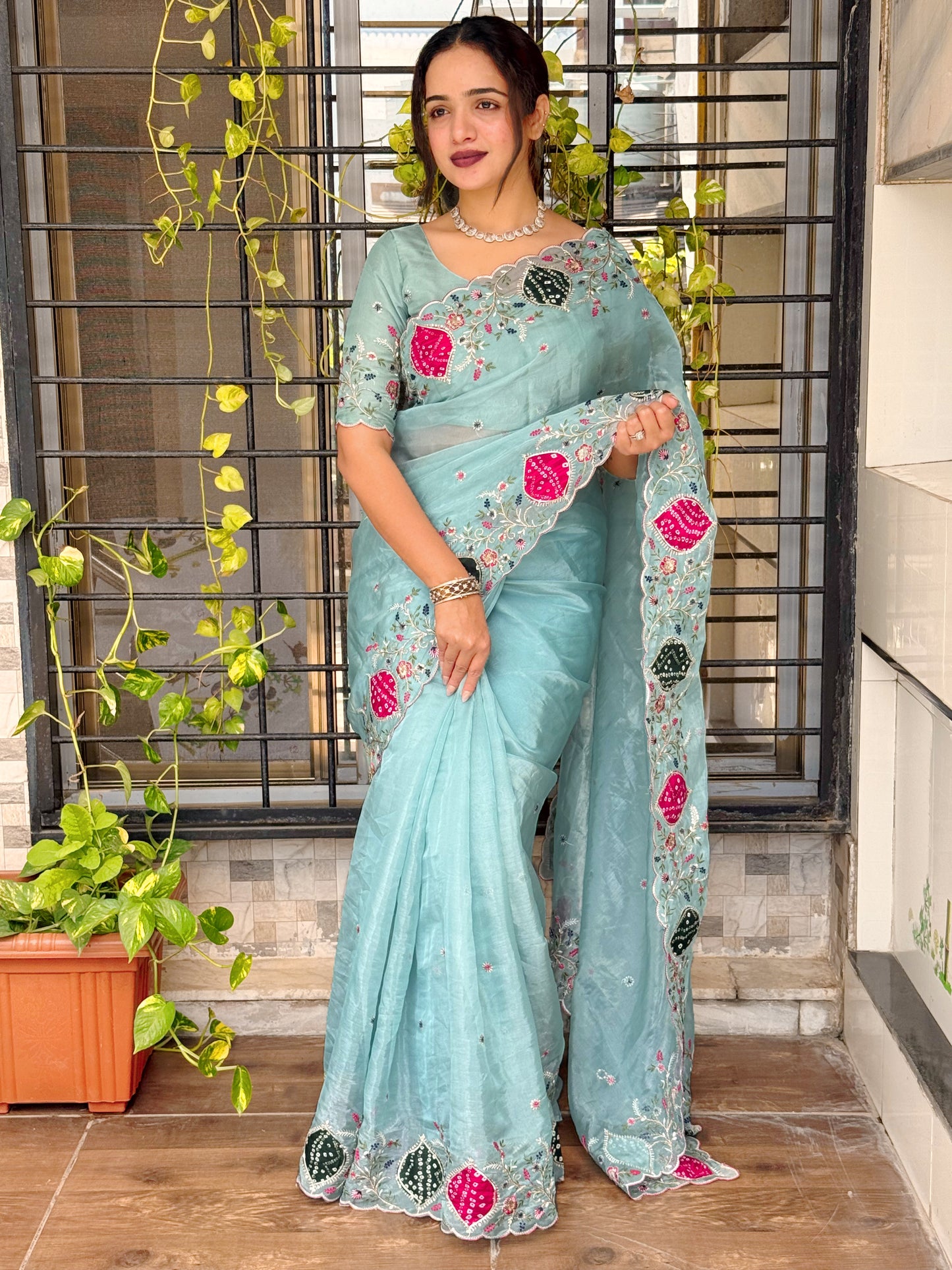 Pastel perfection meets royal elegance saree