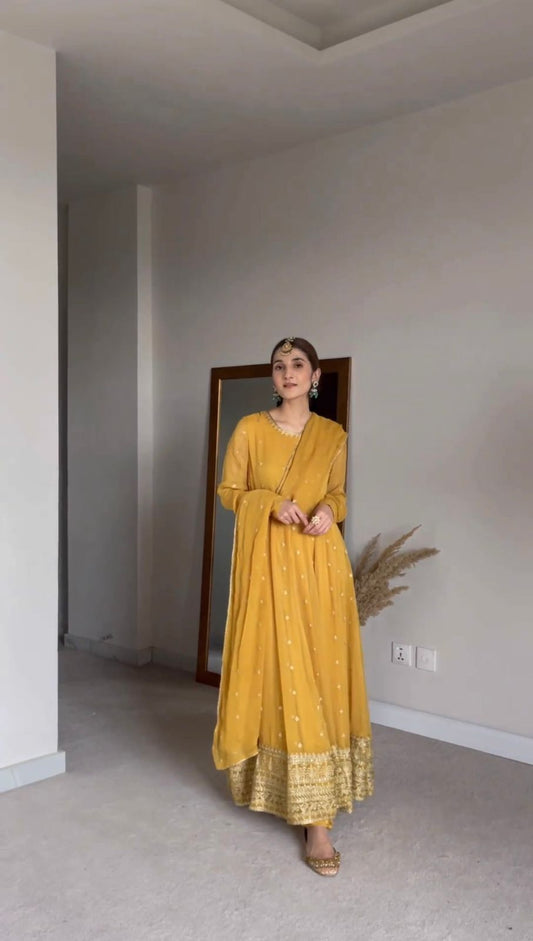 HALDI SPECIAL YELLOW COLOUR  EMBROIDERY WORK GOWN