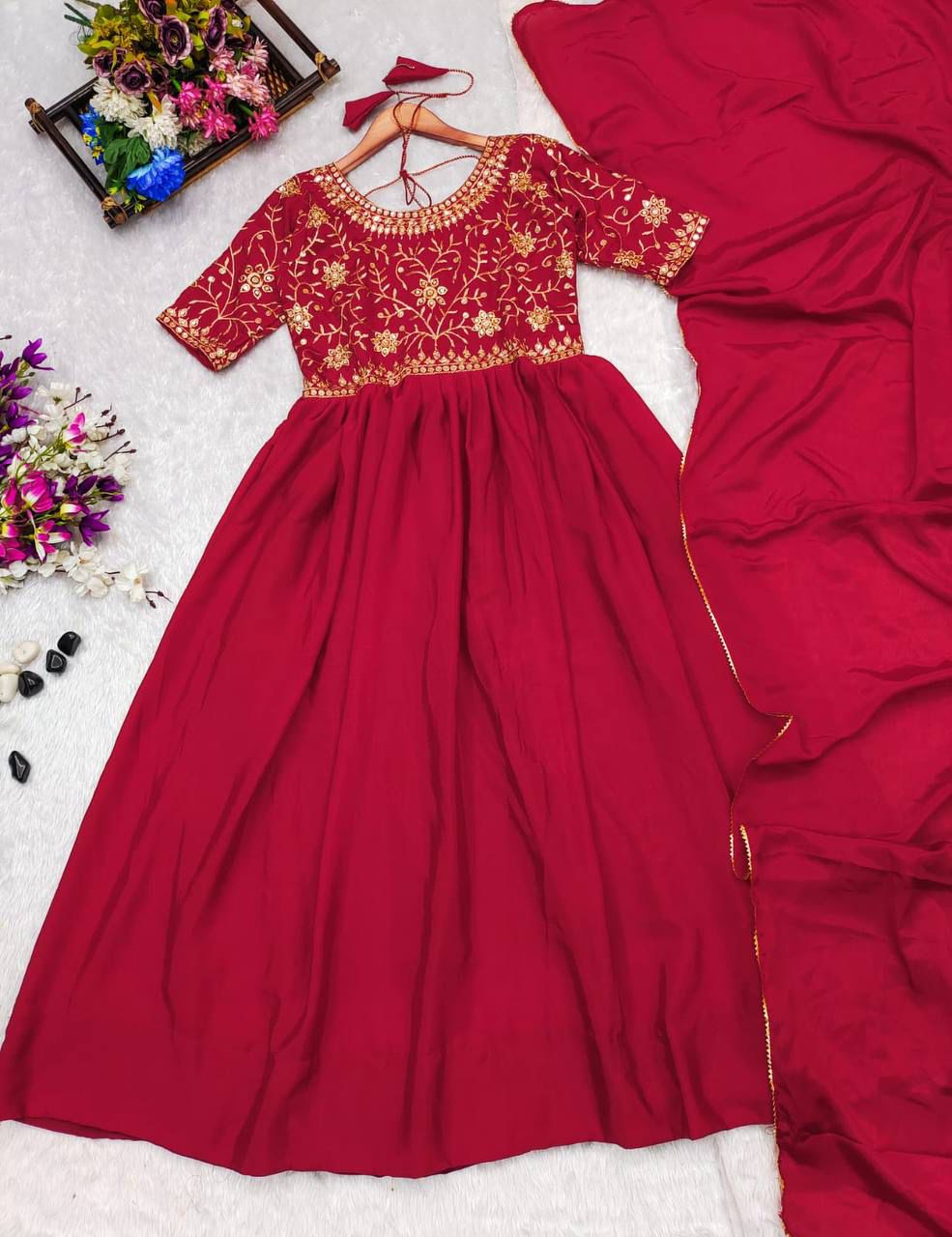 Elegance meets tradition in this Beautiful Chinnon Silk Anarkali