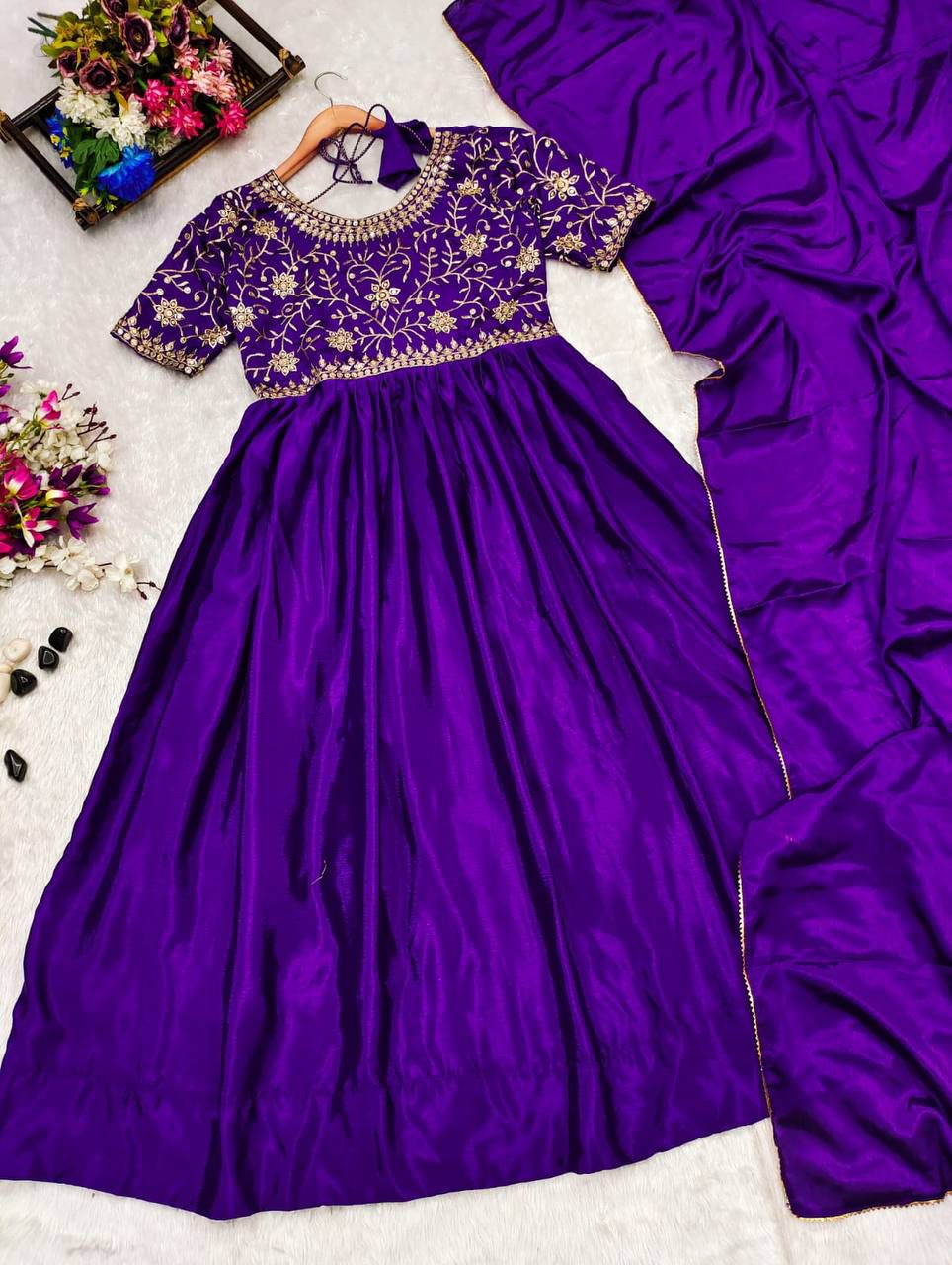 Elegance meets tradition in this Beautiful Chinnon Silk Anarkali