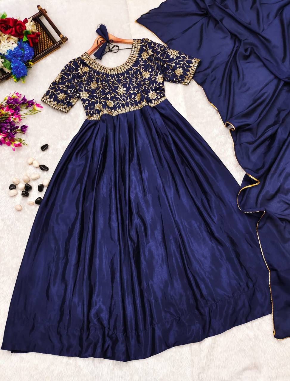 Elegance meets tradition in this Beautiful Chinnon Silk Anarkali