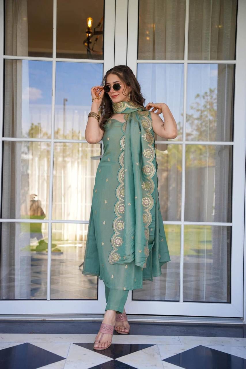 Introducing our exquisite straight olive green heavy embroidered suit